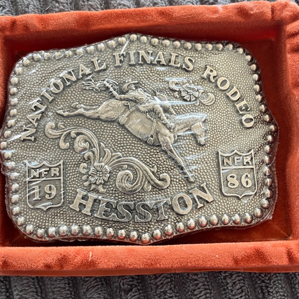 New in Plastic National 1986 Hesston Finals Rodeo Belt Buckle - Silver Tone
